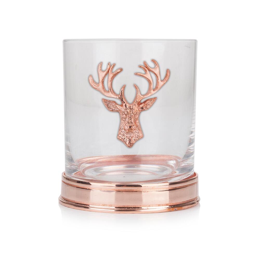 a whisky tumbler with a copper stag head and base