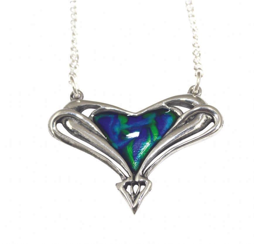 Archibald Knox enamelled heart pendant in Celtic style, crafted from British pewter, perfect for anniversary gifts.