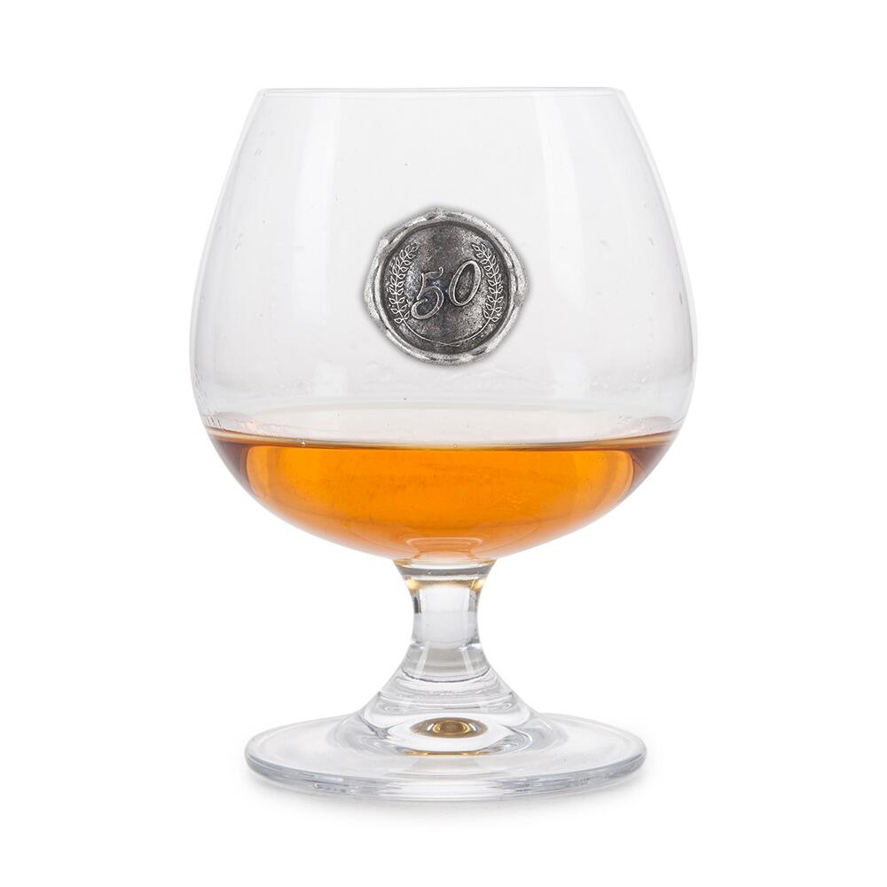 Brandy Glass with a Pewter 50 Monogram badge on the front