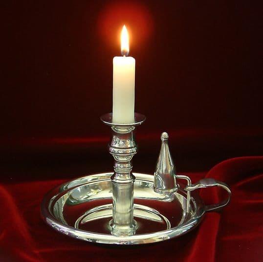 Brass chamber candlestick for ambient lighting in classic dining room decor