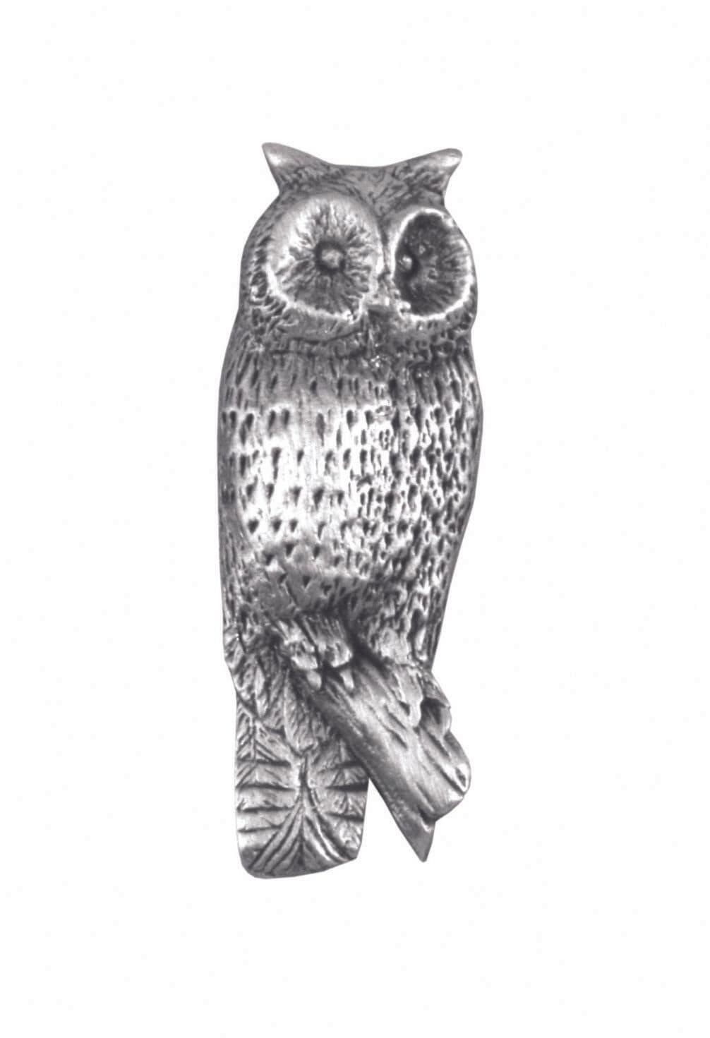 Silver owl brooch with detailed feathers and a perched design.