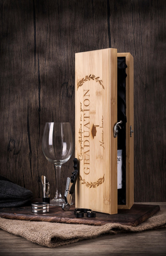 Personalised bamboo graduation wine presentation box with "Congratulations on your Graduation" and name engraving, featuring luxury wine accessories