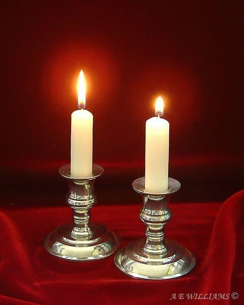 Handcrafted British pewter candlestick pair, 3.5 inches, elegant table decor for ambient lighting.