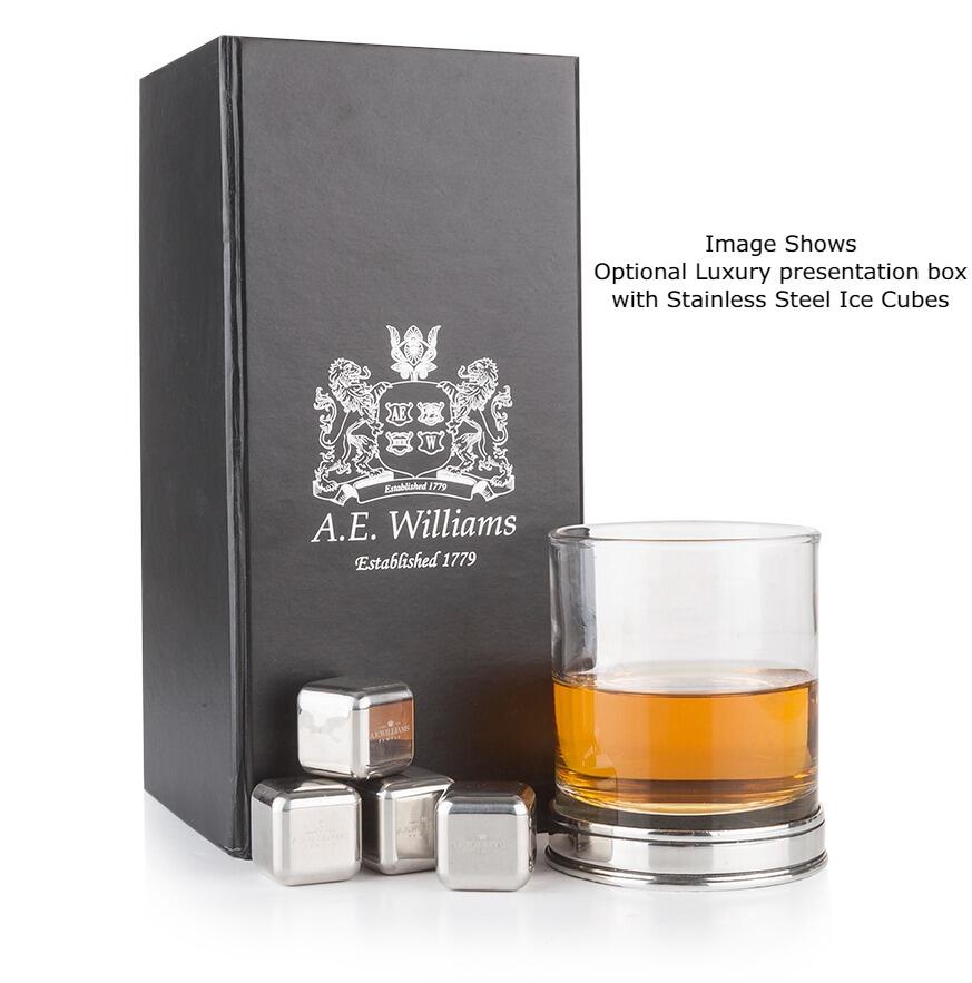 Open black gift box containing a whiskey glass set with tumbler and four metal cooling cubes