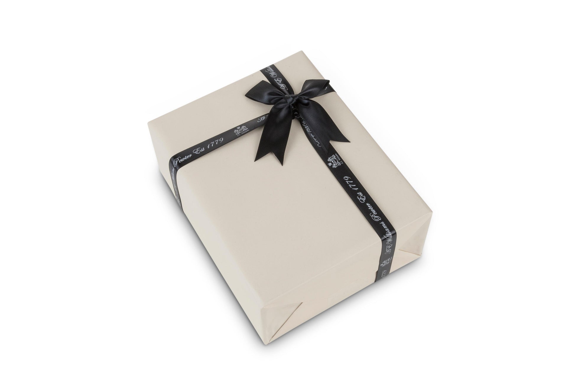 Cream-colored gift box wrapped with a black ribbon and bow, featuring 'A E Williams' printed on the ribbon