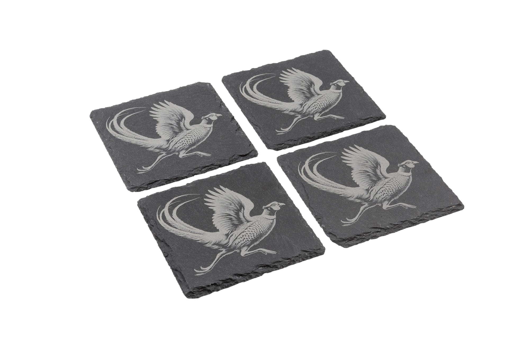 Set of four natural slate coasters with etched Pheasant design