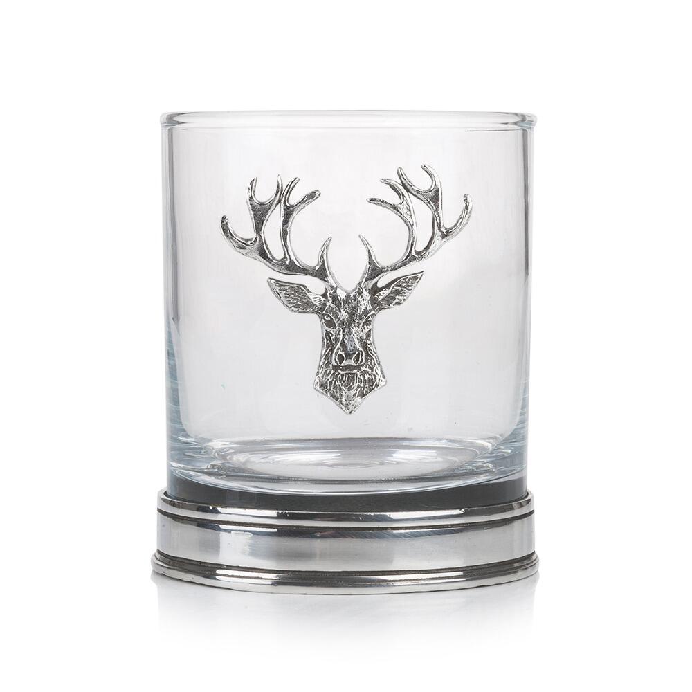 a whisky tumbler with a pewter stag head and base