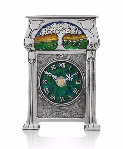Archibald Knox 36 Sunset Clock in British pewter, featuring Arts and Crafts design with intricate detailing.