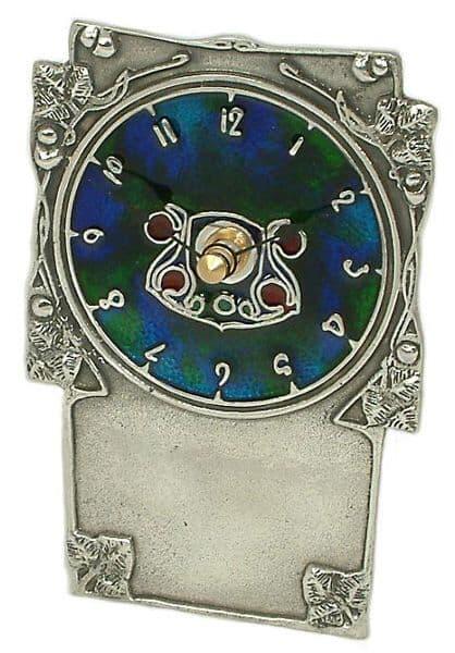 Art Nouveau Archibald Knox clock in British pewter with Celtic design accents