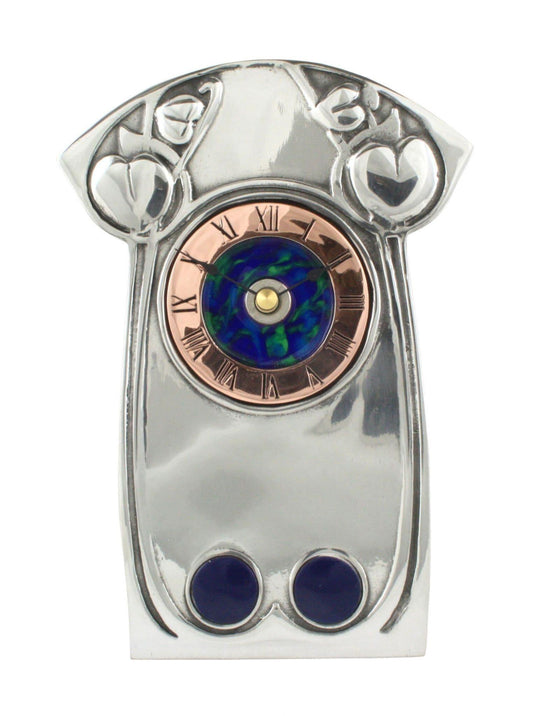 Archibald Knox clock featuring a blue enamel finish and copper dial in Art Nouveau style