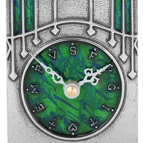 Archibald Knox Clock 46 in British pewter with Celtic design, showcasing Arts and Crafts style.