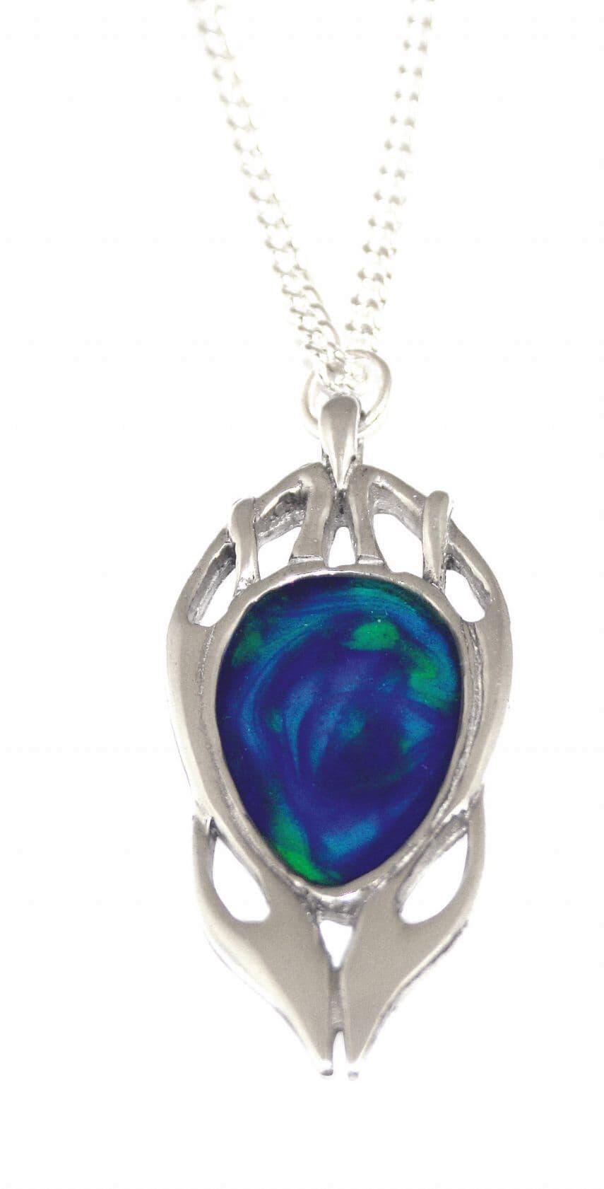 Art Nouveau style enamelled pendant in British pewter featuring Celtic design by Archibald Knox