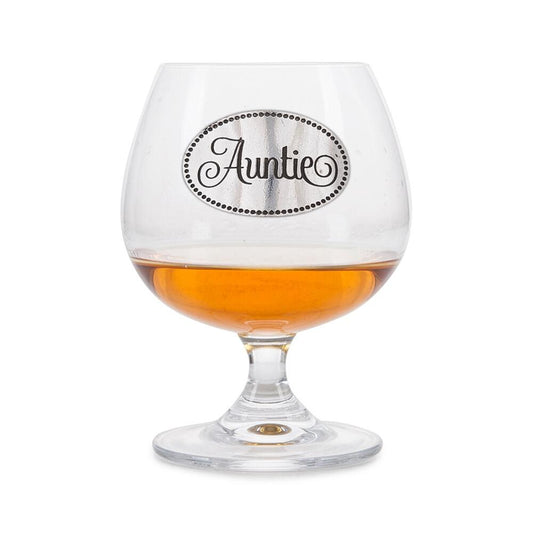 A Brandy Glass with a Pewter label that says Auntie