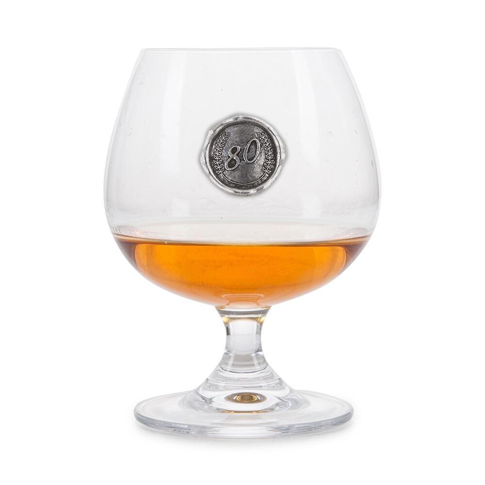 Brandy Glass with a Pewter 80 Monogram badge on the front