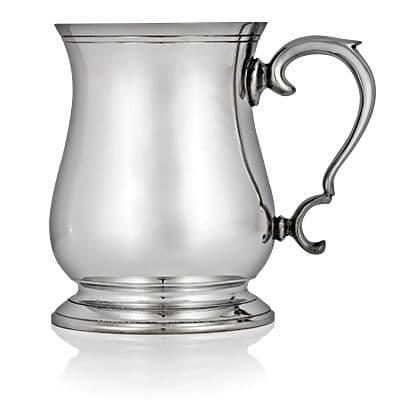 Silver-plated mug with a curved handle and ornate base.