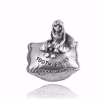 Silver tooth fairy figurine sitting on a pillow with "TOOTH FAIRY" engraved.