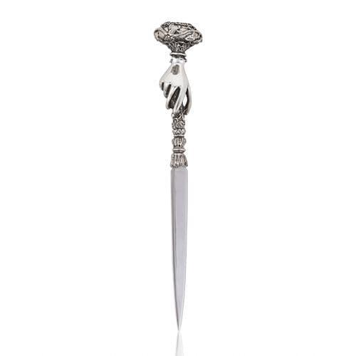 Silver letter opener with ornate hand-shaped handle and sharp stainless steel blade
