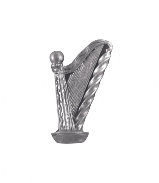 Silver metal harp brooch with intricate detailing and a polished finish.