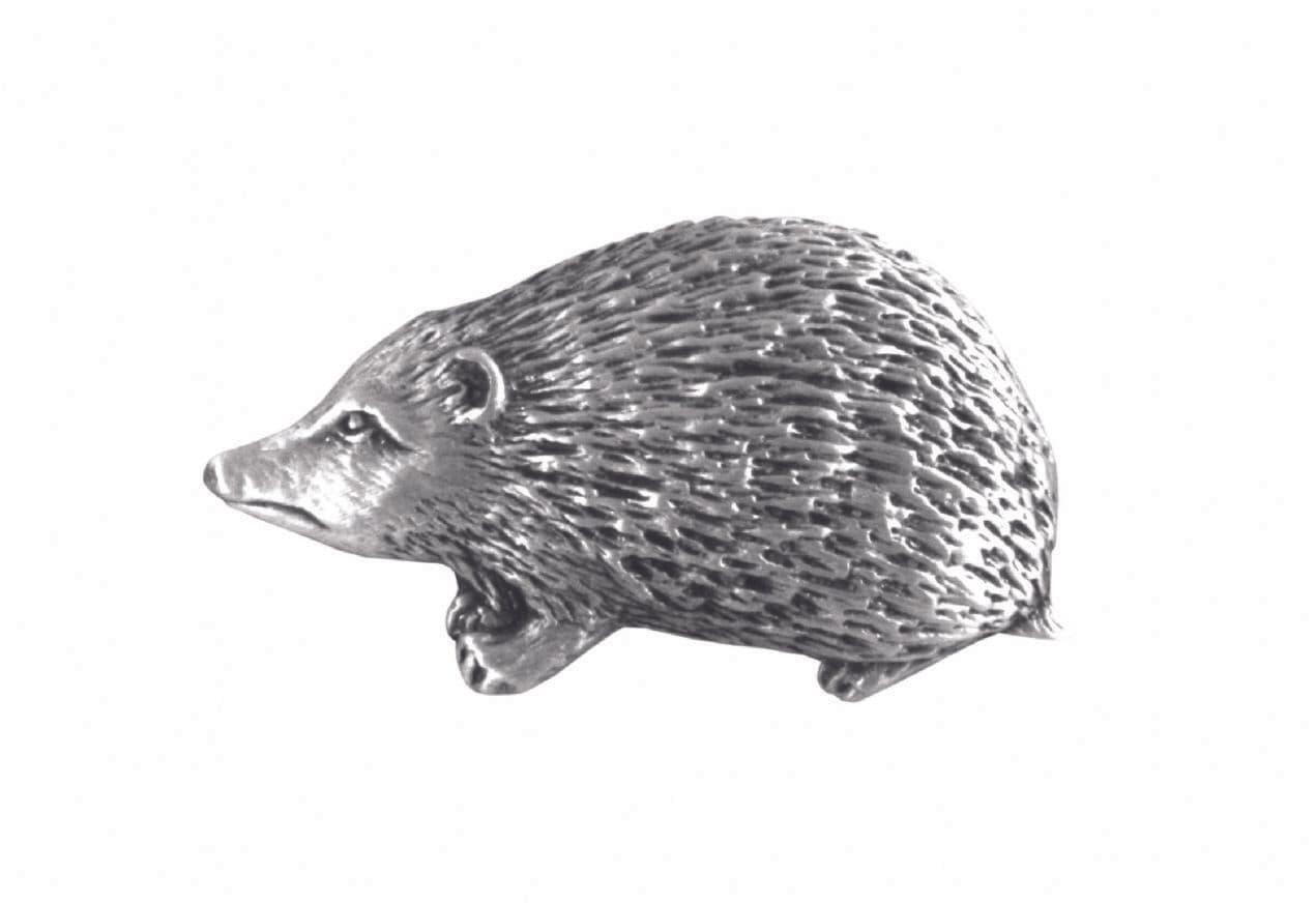 Silver hedgehog figurine with detailed fur texture and realistic features.