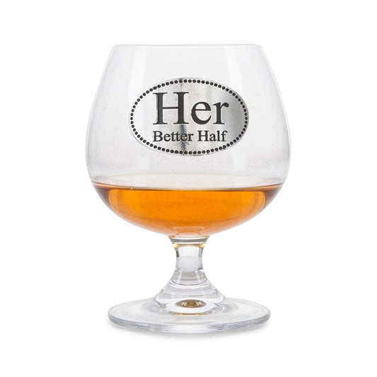 Crystal brandy glass with pewter "Her Better Half" emblem, partially filled with amber liquid