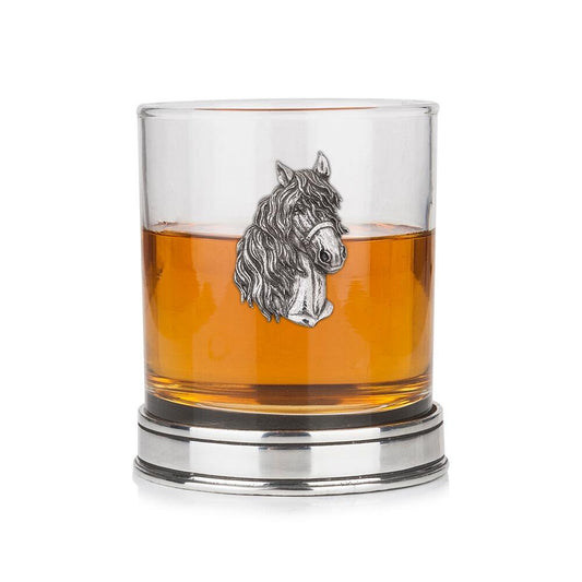 Whisky tumbler with pewter horse emblem and polished base, partially filled with amber liquid