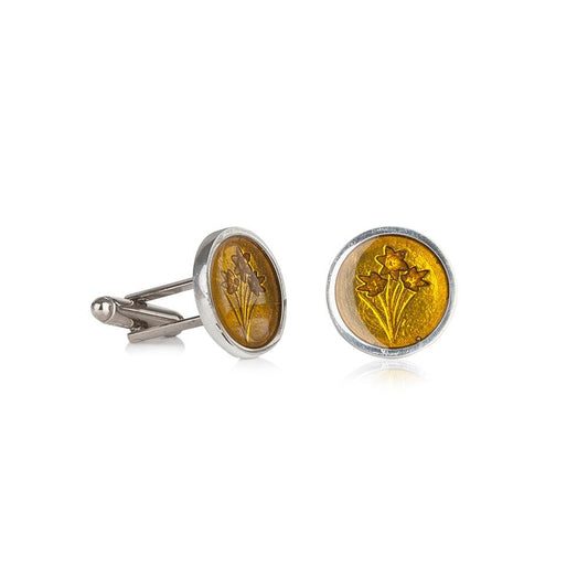 Handcrafted pewter cufflinks with detailed daffodil design embossed in transparent yellow enamel