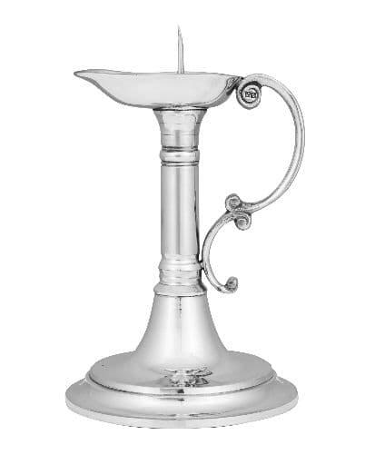 Silver decorative oil lamp with ornate handle and polished finish.