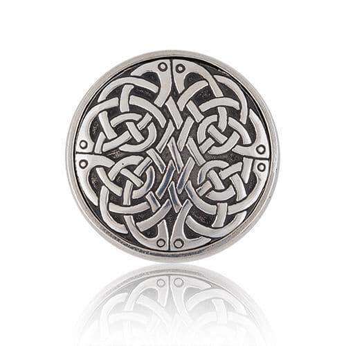 Silver Celtic knot brooch with intricate interwoven design.