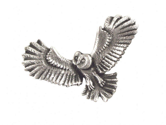 Silver owl brooch with detailed feathers and outstretched wings.