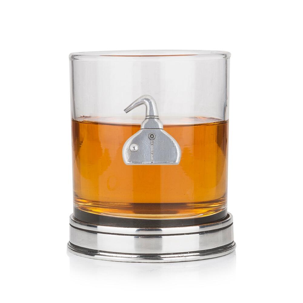 Whisky tumbler with pewter pot still motif and polished base, partially filled with amber liquid