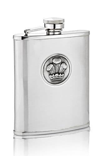 Silver stainless steel flask with a decorative emblem and screw-top lid.