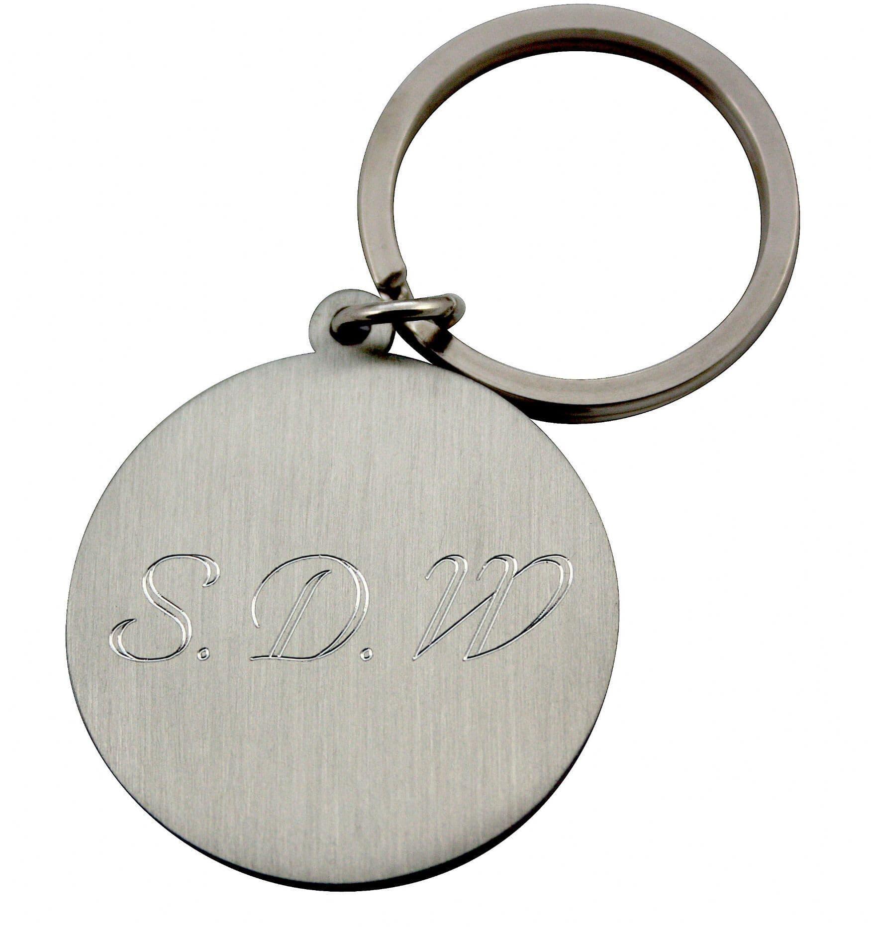 Brushed stainless steel keychain with engraved initials "S.D.W.