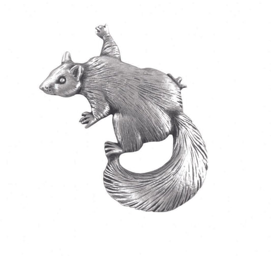 Silver squirrel brooch with detailed fur texture and a curled tail.