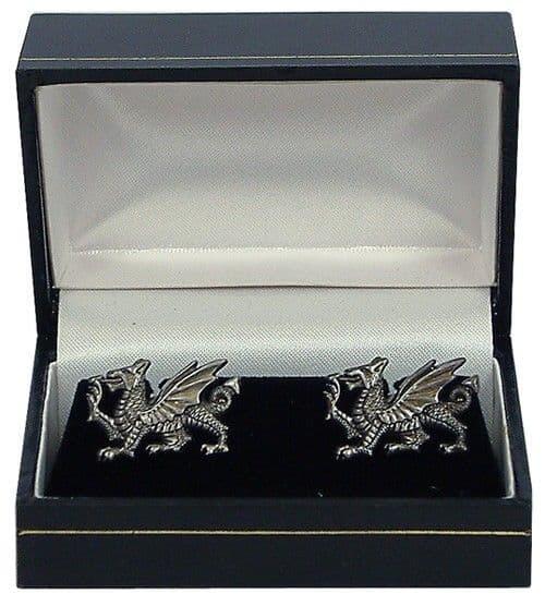 Silver griffin cufflinks in a black presentation box with a velvet interior.