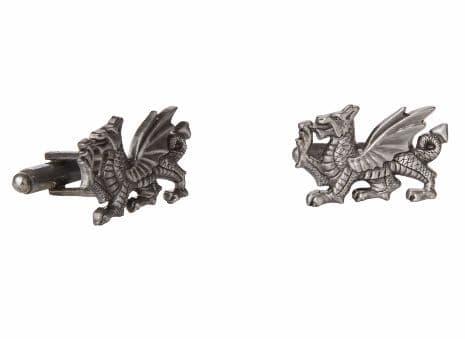 Antique silver dragon cufflinks with intricate detailing and a polished finish.