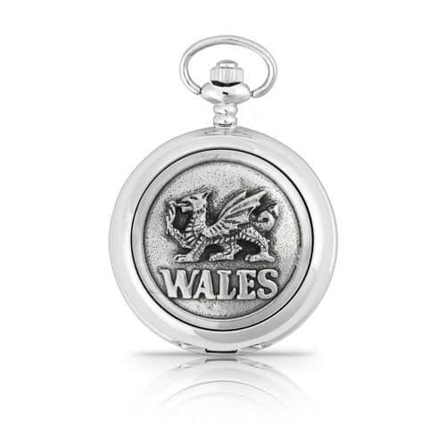 Silver pocket watch featuring a Welsh dragon design and "Wales" inscription.